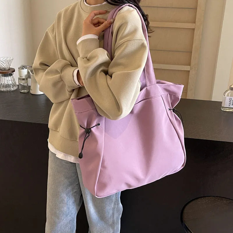 Soft Oxford cloth folding tote bag in street trend style shown in multiple colour options