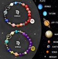 Set of twelve natural stone beaded bracelets, each representing a different zodiac sign.