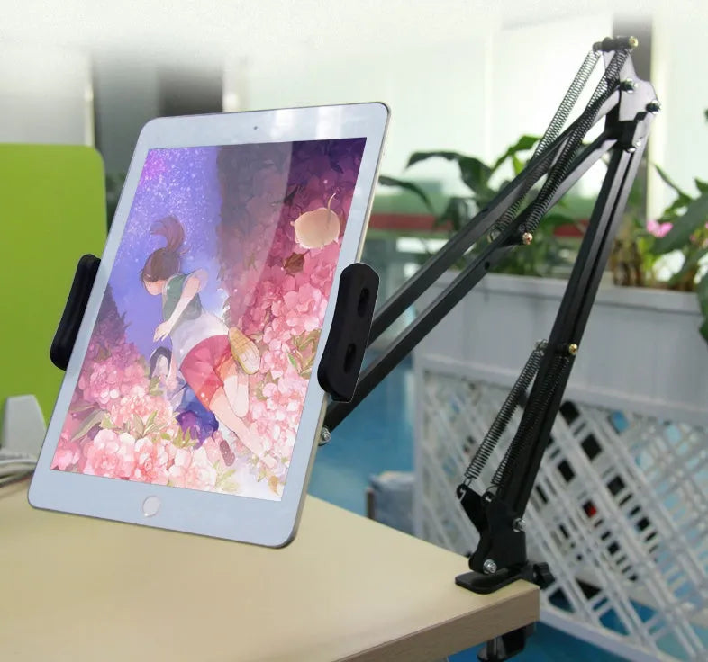 Adjustable black phone tablet stand on desktop holding mobile device at viewing angle