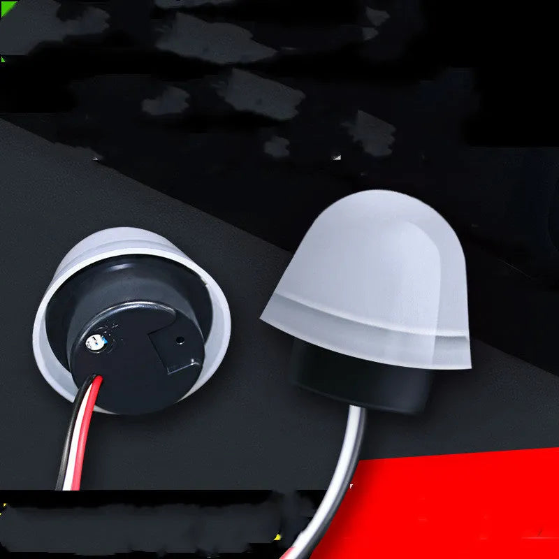 White automatic induction street lamp with sensor for outdoor security lighting.