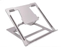 Silver aluminium foldable laptop stand with double silicone snaps, measuring 240x230x18mm, on a desk