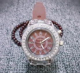 Women's LED luminous quartz watch with round 43mm alloy case and silicone strap in multiple colour options