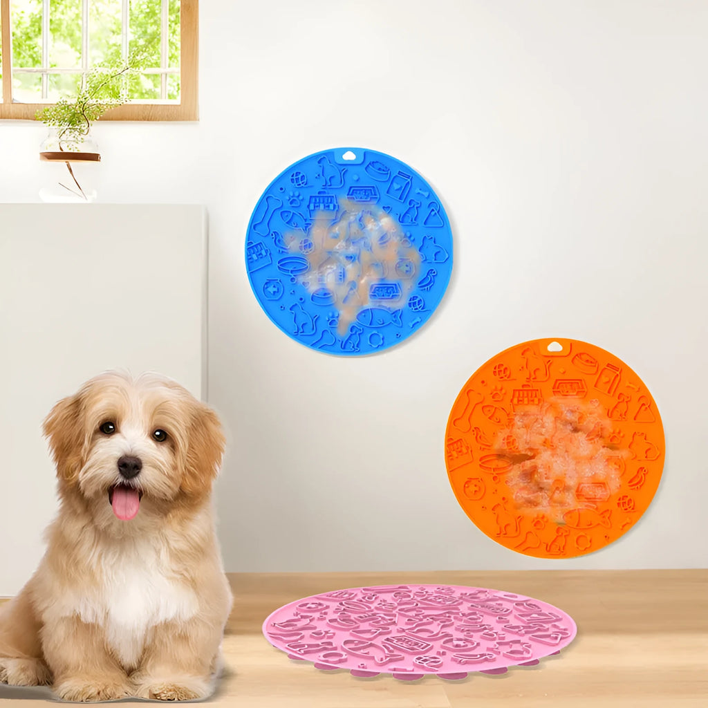 Round blue silicone pet licking mat with textured surface and white sucker on reverse.