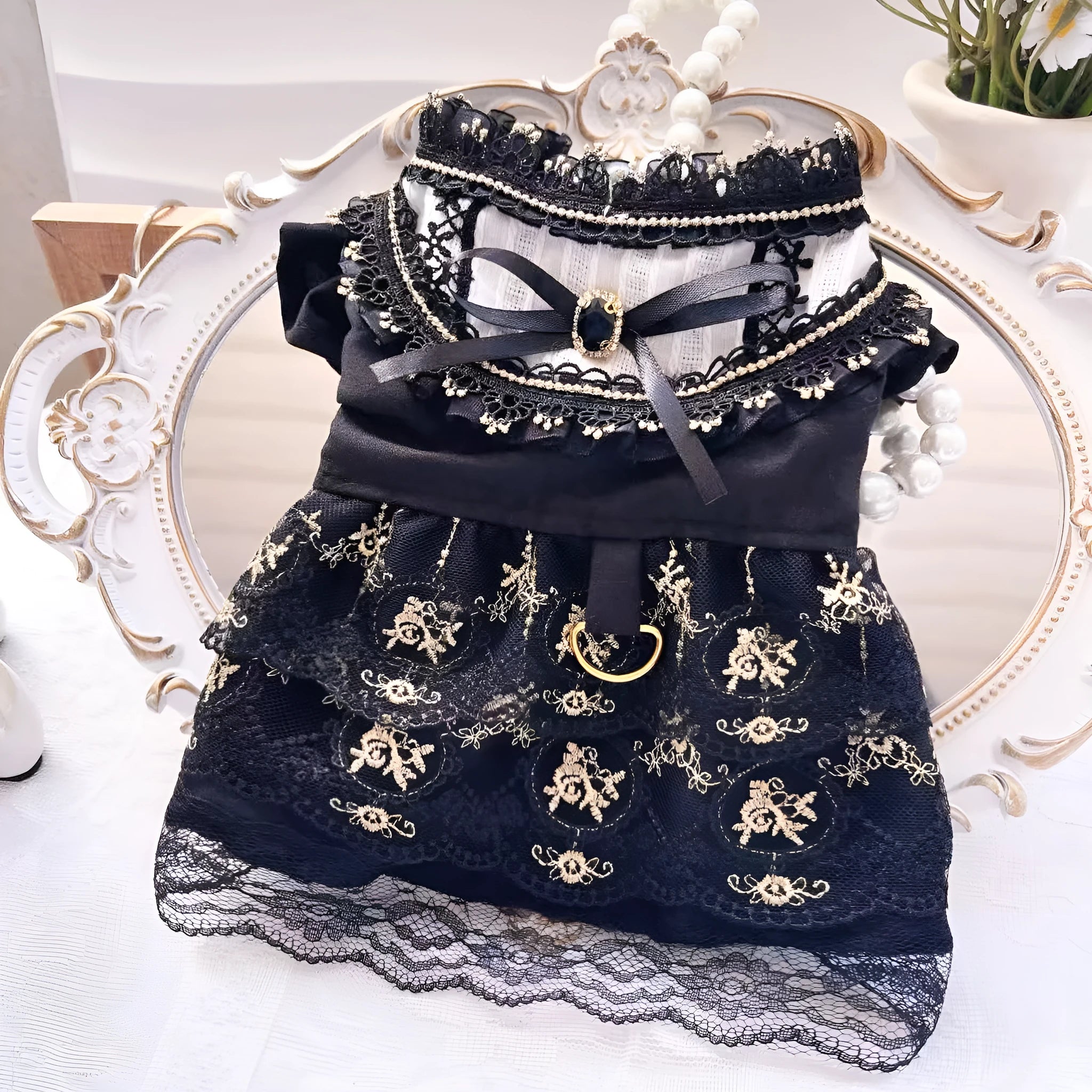 Golden gothic princess-style dress for a small dog or cat on a mannequin.