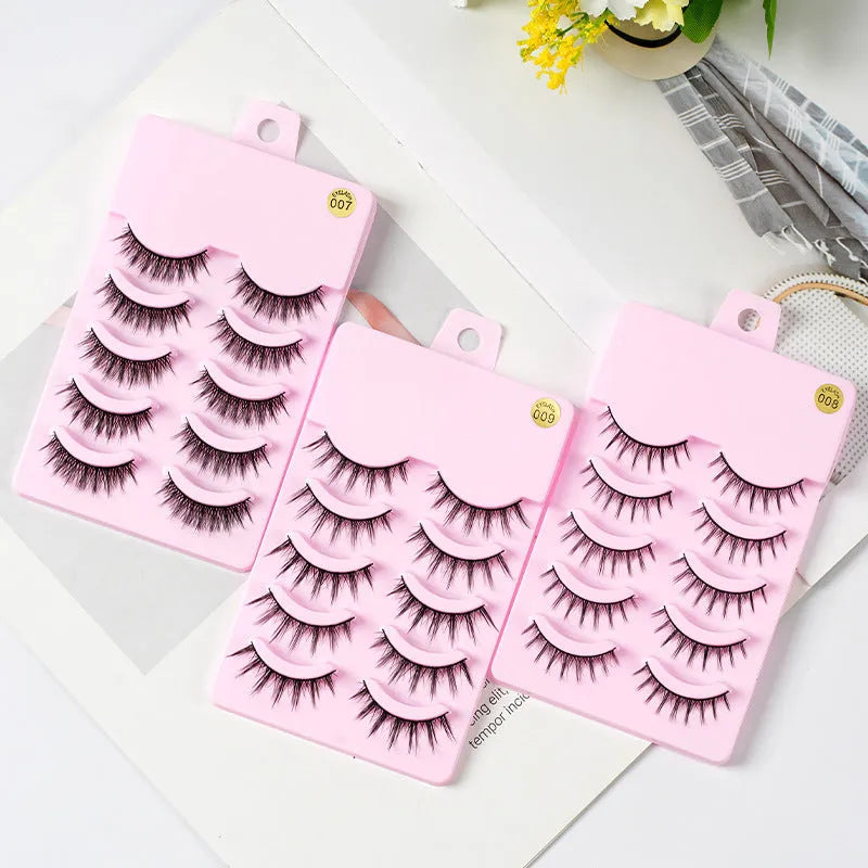 Pack of 5 pairs of black manga-style false eyelashes with natural wispy length on a white background.