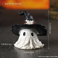 Resin wizard hat ornament in black and purple colours for Halloween and holiday decorating