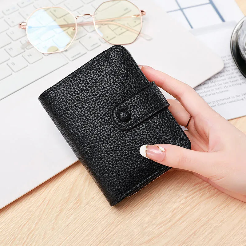 Ladies short wallet with lychee pattern in beige, pink, black and red colour options showing two-fold design