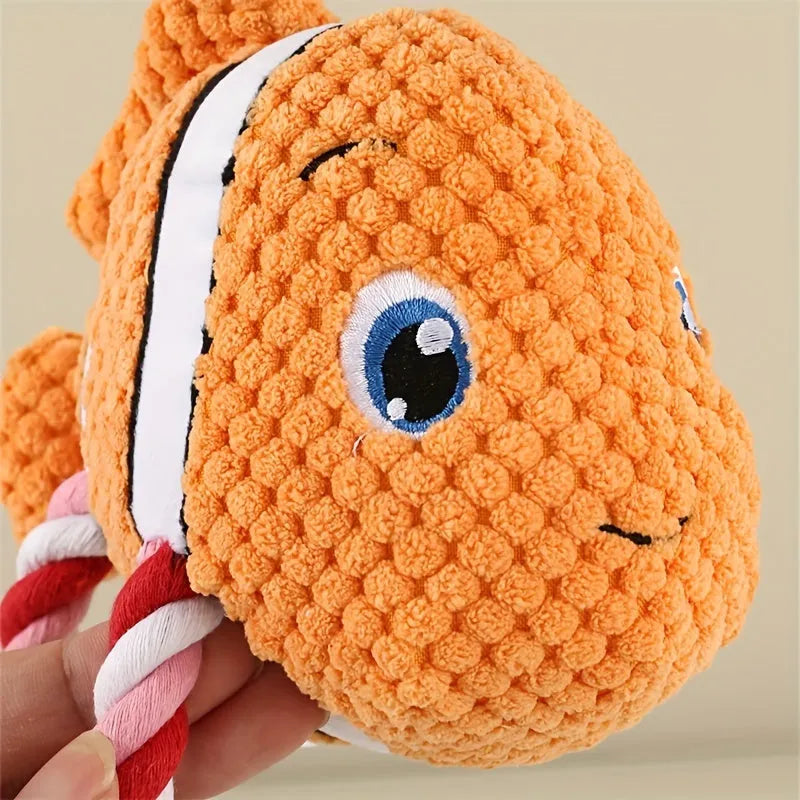 Turtle-shaped dog chewing toy with knot elements in grey green orange colours for medium large dogs