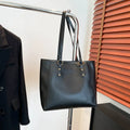 Korean style square shoulder underarm crossbody bag in PU leather, showing sandwich pocket detail.