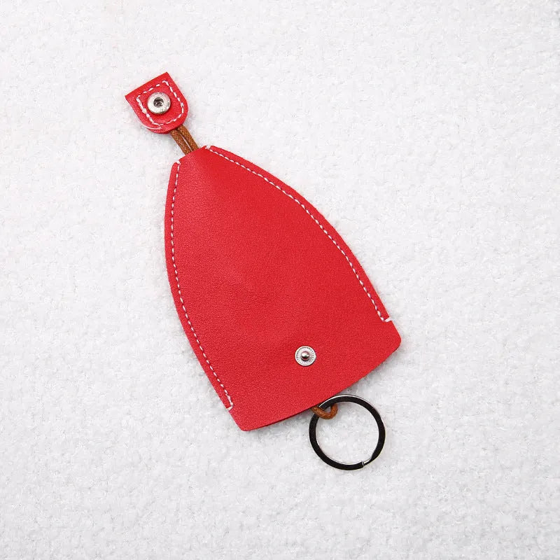 Cartoon pull-out key case in PU leather measuring 14 by 7.5 centimetres