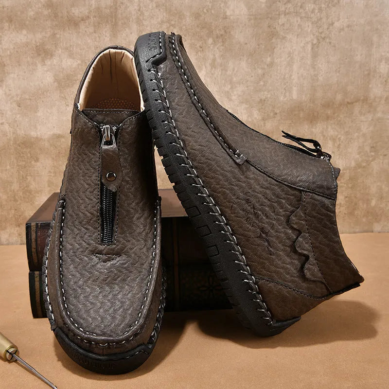 Men's black slip-on loafers with rubber soles and round toe design