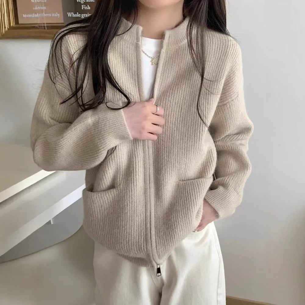 Women's soft sweater coat in temperature-sensitive fabric showing beige colour option with long sleeves and cardigan styling
