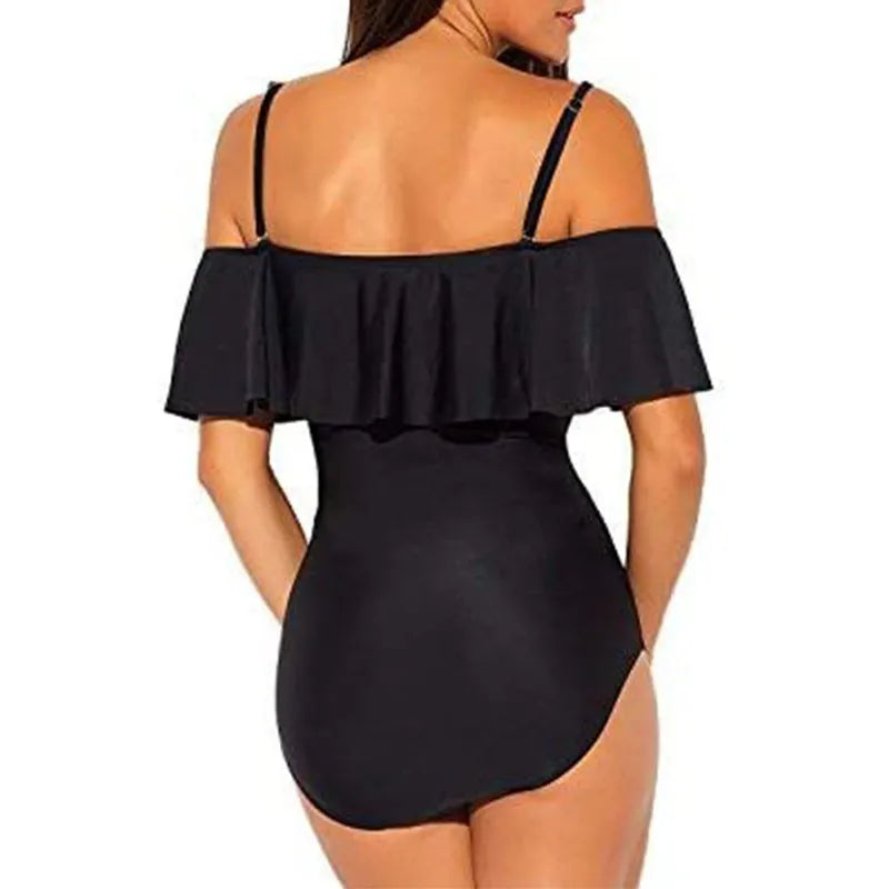 Black one-piece swimsuit with ruffled tube top straps and a cut-out design.