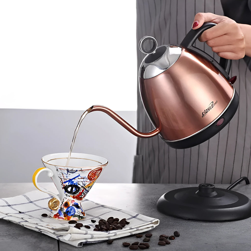 White, yellow, and gold stainless steel electric kettle with touch controls and 1-litre capacity.