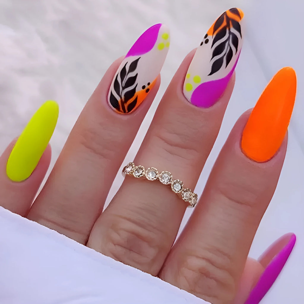Wear Armour medium almond frosted nail stickers showing four designs: French colourful leaves, star flash macaron, gradient leopard print and colourful plating