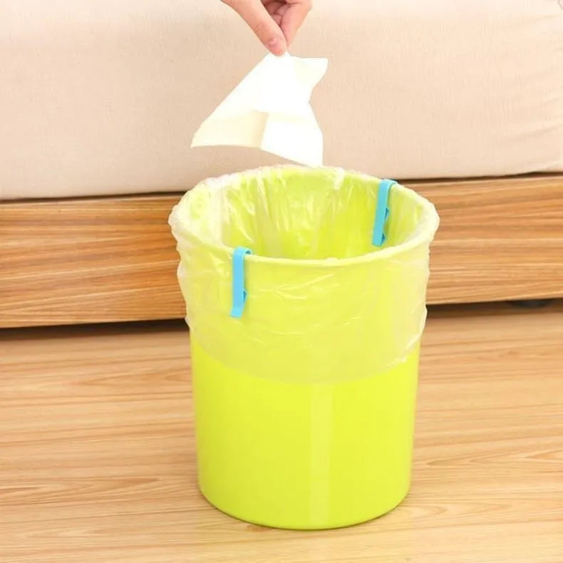 PP plastic non-slip clip for fixing a bin bag to the side of a trash can.