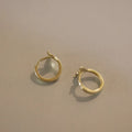Gold and white gold fishtail hoop earrings made from 925 sterling silver