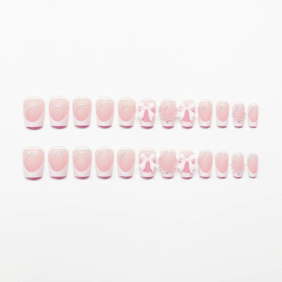 French manicure nail art set with bow, tulip, and starry sky designs on short European square nails