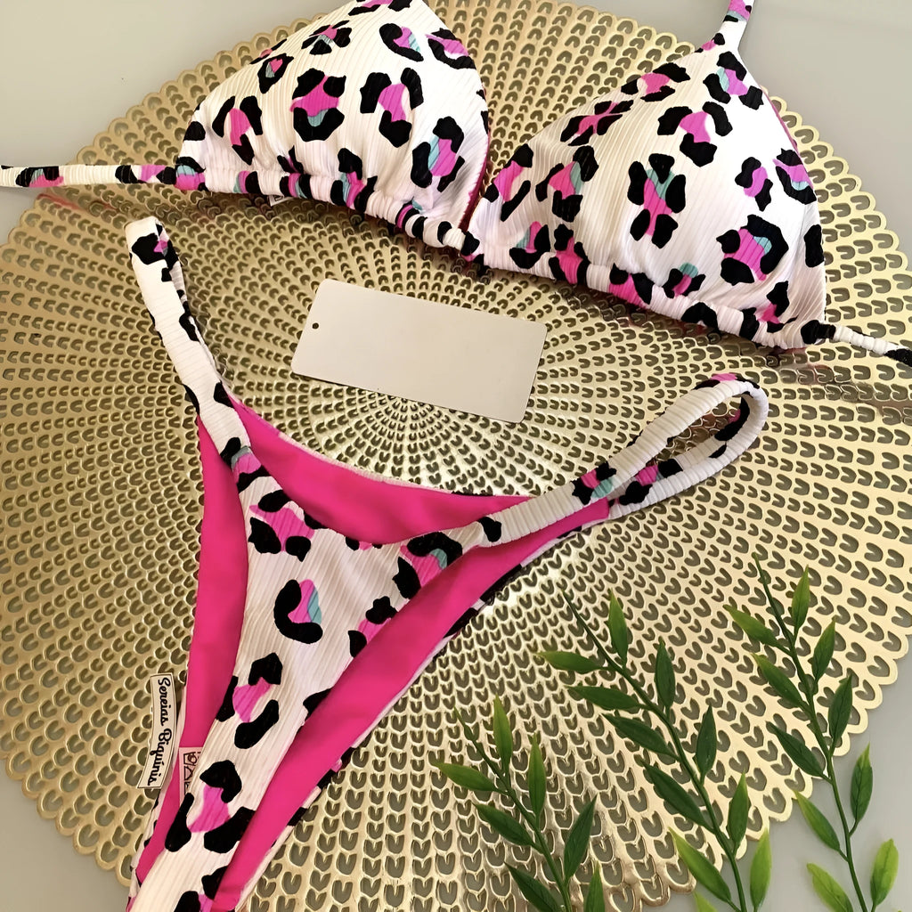 Women's briefs-style bikini swimsuit in a printed pattern, made from nylon with a cotton lining.