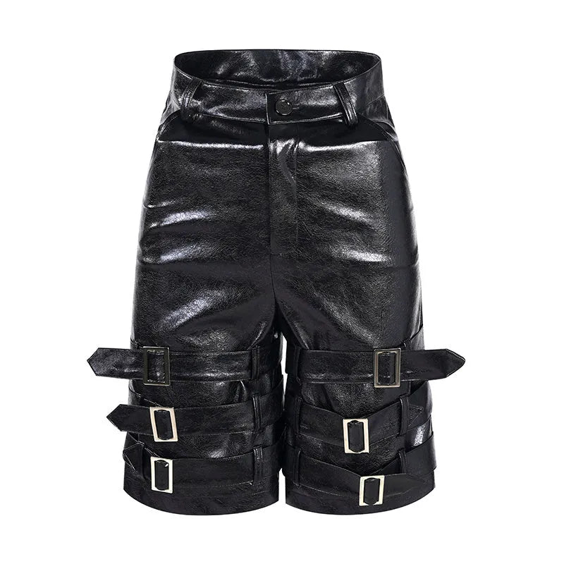 Black men's PU leather cropped shorts with a ring detail on the leg, shown on a model.