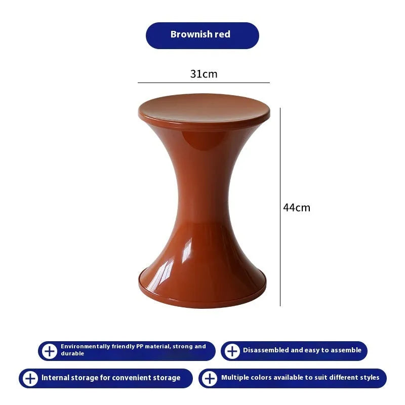 Plastic shoe changing stool with hourglass design in green colour, 40cm height