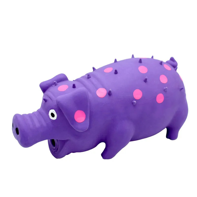 Pig-shaped blue latex dog chew toy with textured surface and squeaker for teeth cleaning