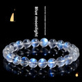 Natural cream coloured crystal bracelet with smooth ground beads, shown in a minimalist unisex style.