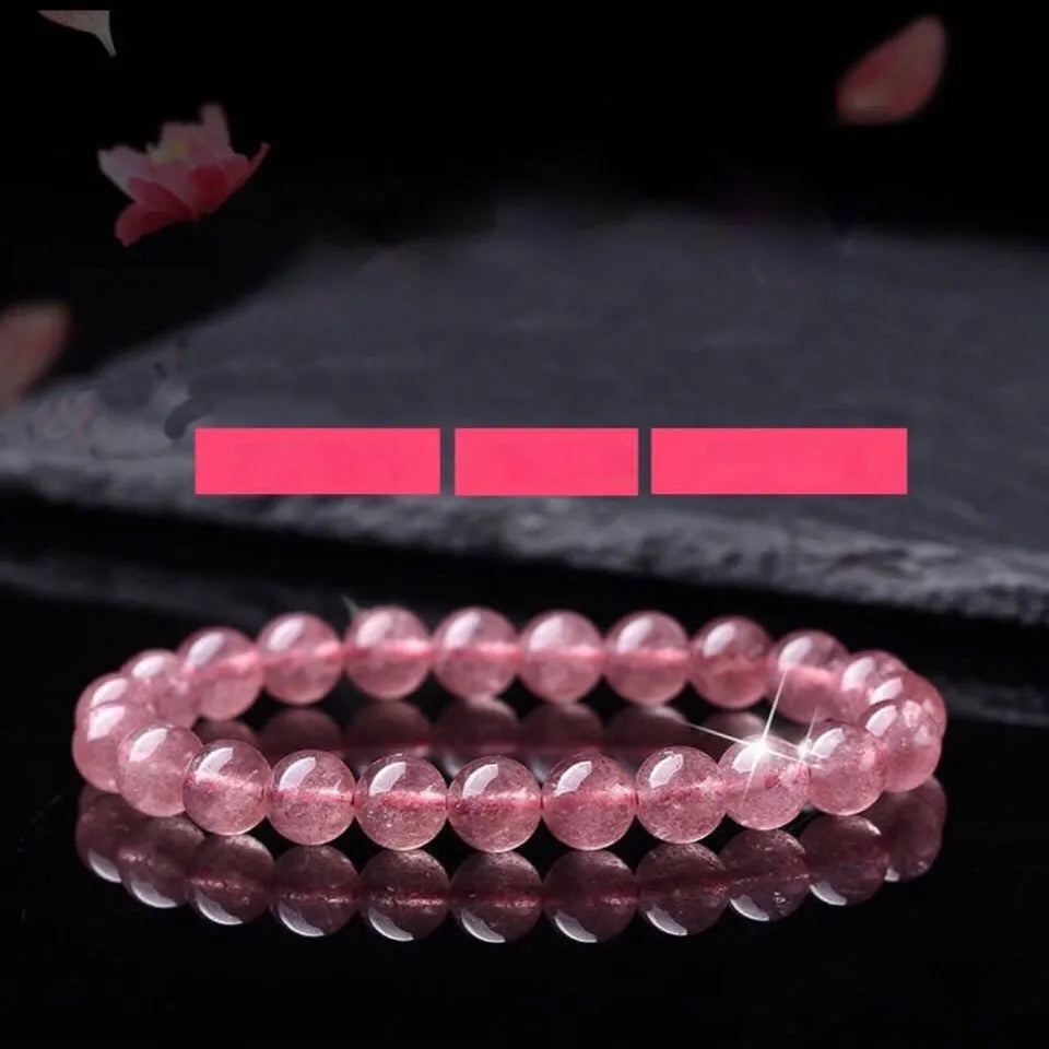Women's strawberry quartz bracelet with polished crystal beads in choice of 6mm, 8mm or 10mm sizes