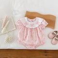 Pink cotton triangle romper jumpsuit for baby girl with three bow details, short sleeves, suitable for height 66-90cm