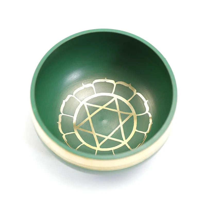 Seven colourful handmade Himalayan-style bowl percussion instruments arranged by size and colour