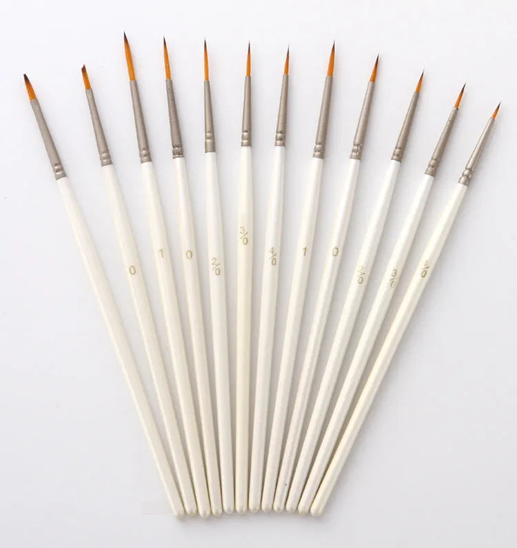 Set of twelve pearl white fluorescent marker pens with nylon wool brush tips and solid wood holders for watercolour art.