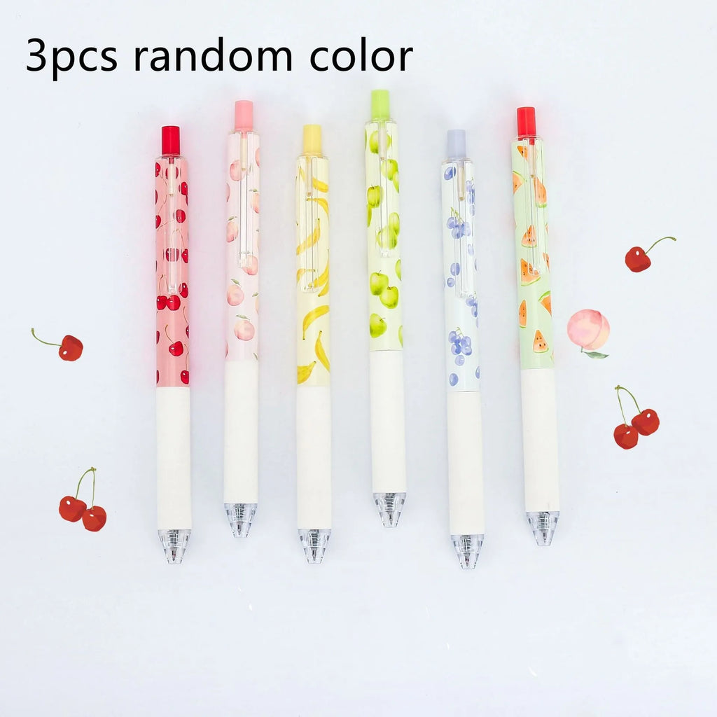 Three fruit scented press-action pens with 0.5mm quick-drying black refills on white background