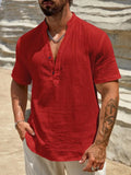 Men's solid colour stand collar short-sleeved shirt in a breathable polyester blend fabric.