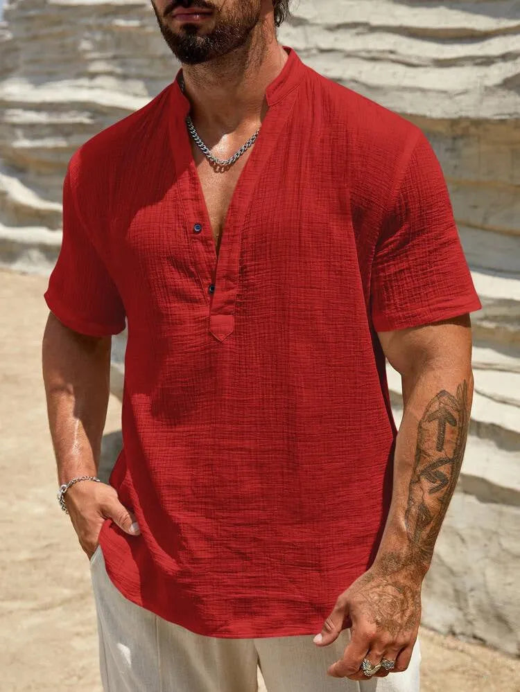 Men's solid colour stand collar short-sleeved shirt in a breathable polyester blend fabric.