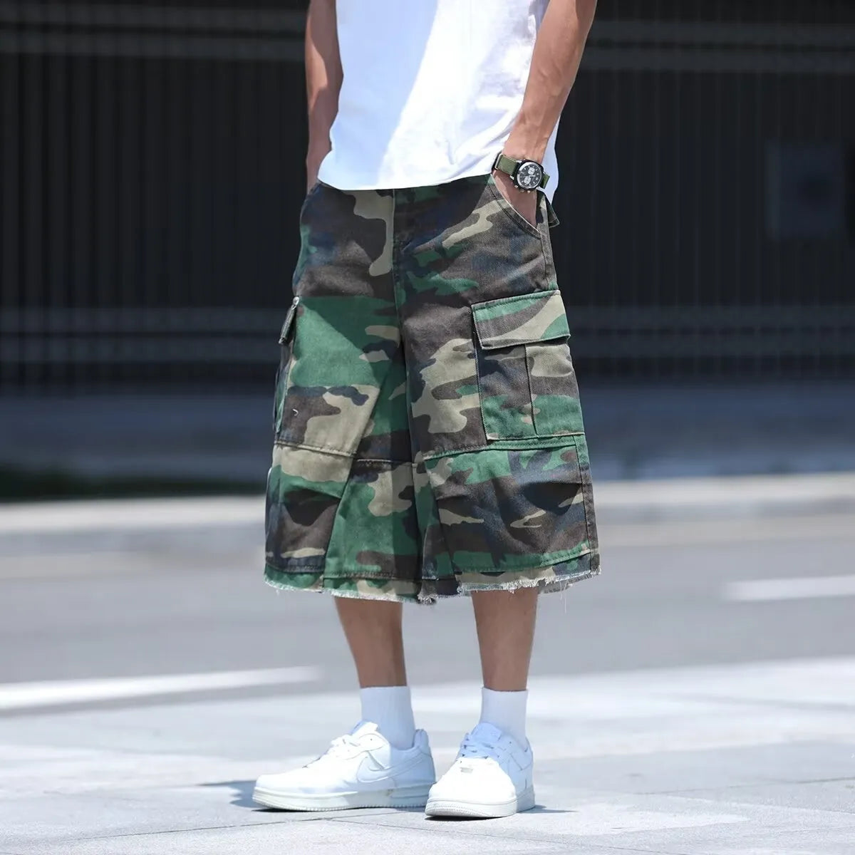 American retro camouflage work shorts in loose cropped fit on mannequin