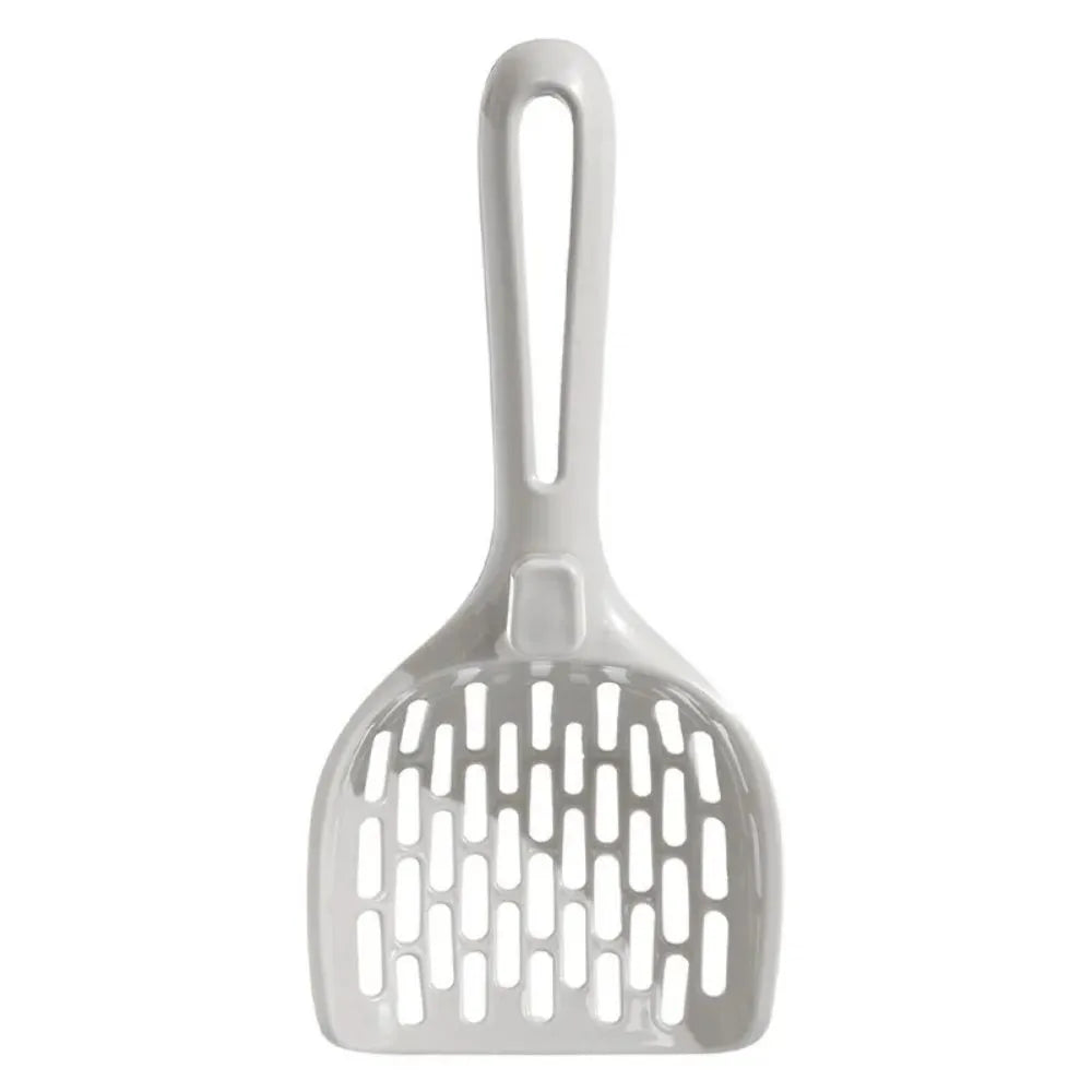 Grey plastic cat litter scoop with perforations and a separate storage base for cat litter box cleaning.