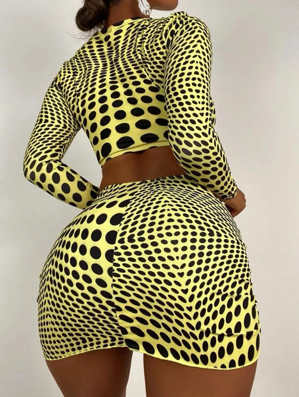 Women's green polka dot swimsuit three-piece set showing top, skirt, and bra components