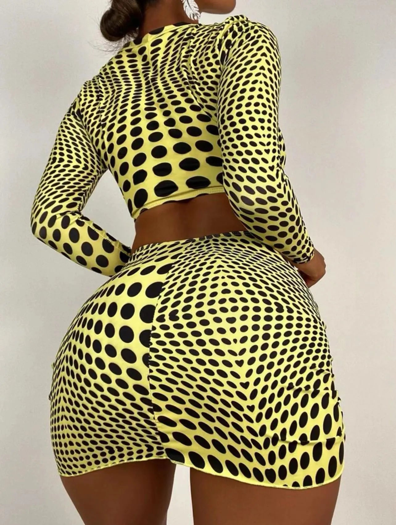 Women's green polka dot swimsuit three-piece set showing top, skirt, and bra components