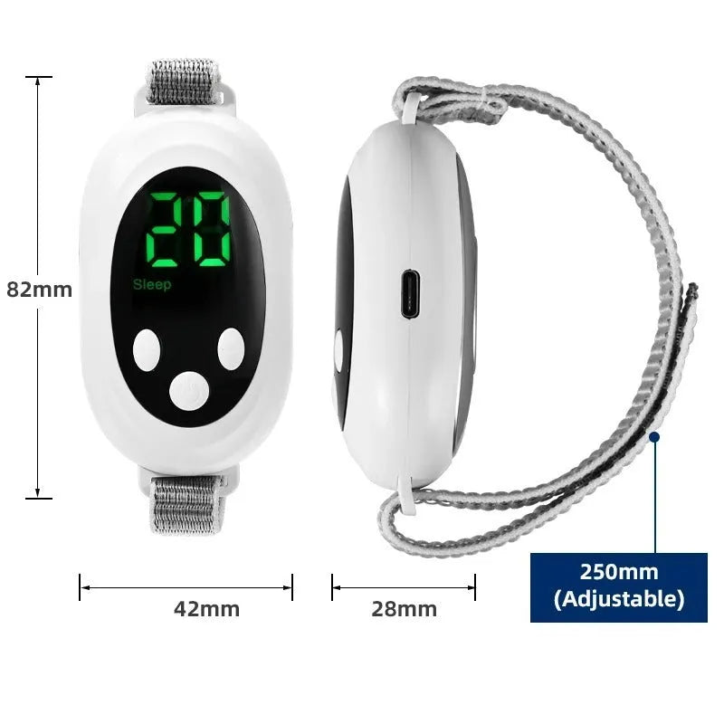 White handheld sleep aid remote control with digital display, charging cable, and wearable sleep bracelet on a flat surface.