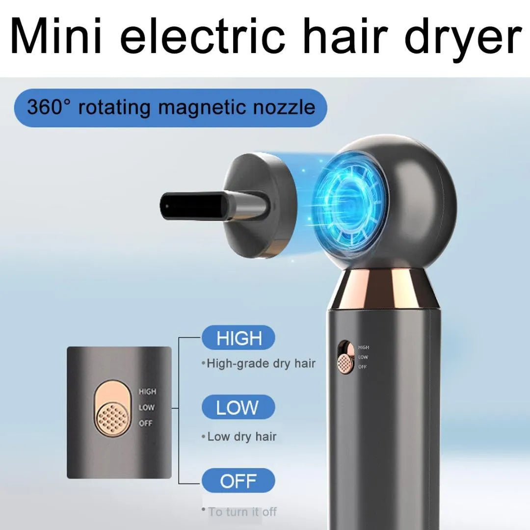 Compact white hair dryer with concentrator nozzle and diffuser attachment on a table.