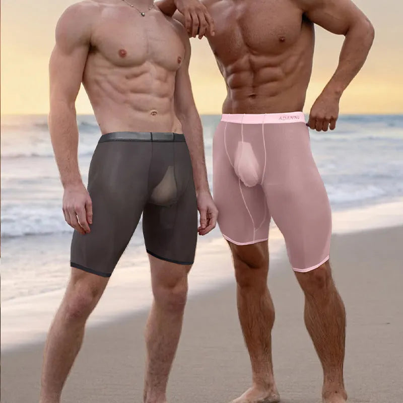 Men's seamless knit nylon home shorts in black, shown flat.