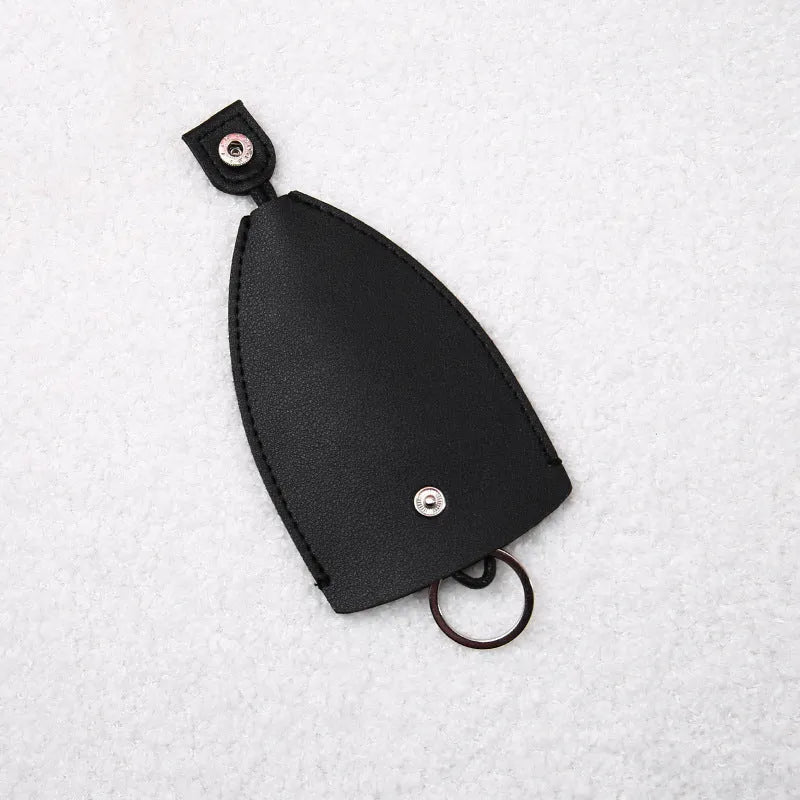 Cartoon pull-out key case in PU leather measuring 14 by 7.5 centimetres