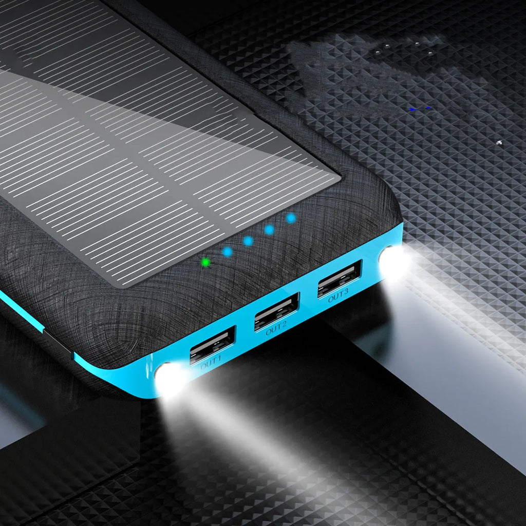 Solar power bank with wireless charging surface, three USB ports, and LED flashlight in black colour