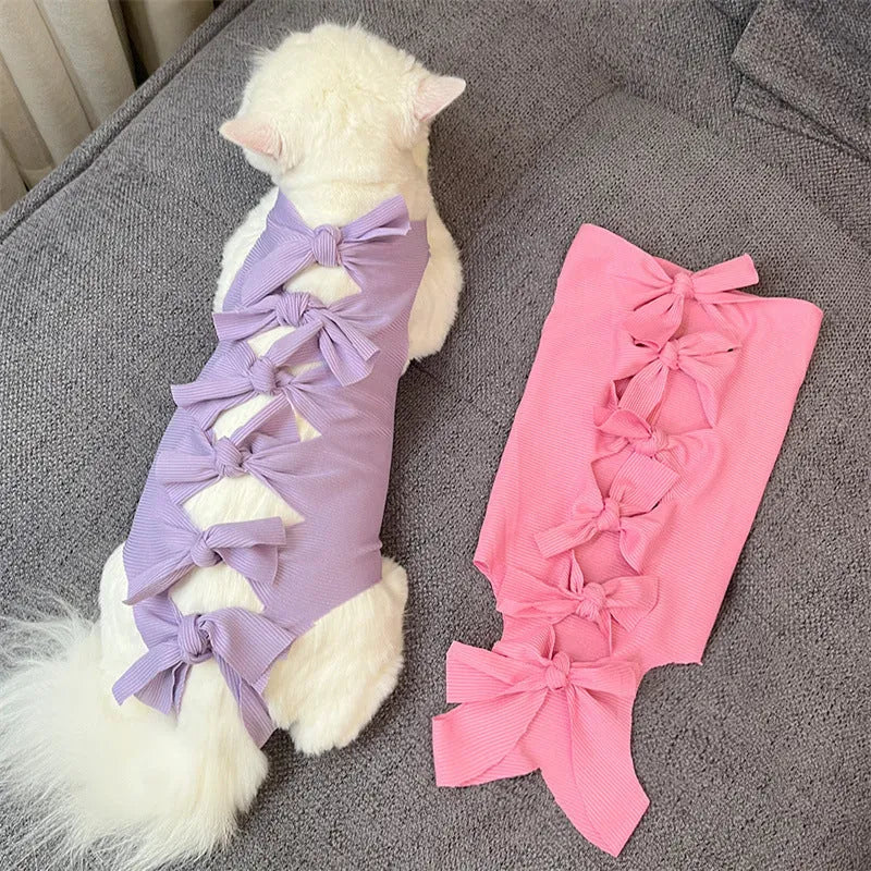 Lace-up polyester cat sterilisation recovery suit in assorted colours on a size chart