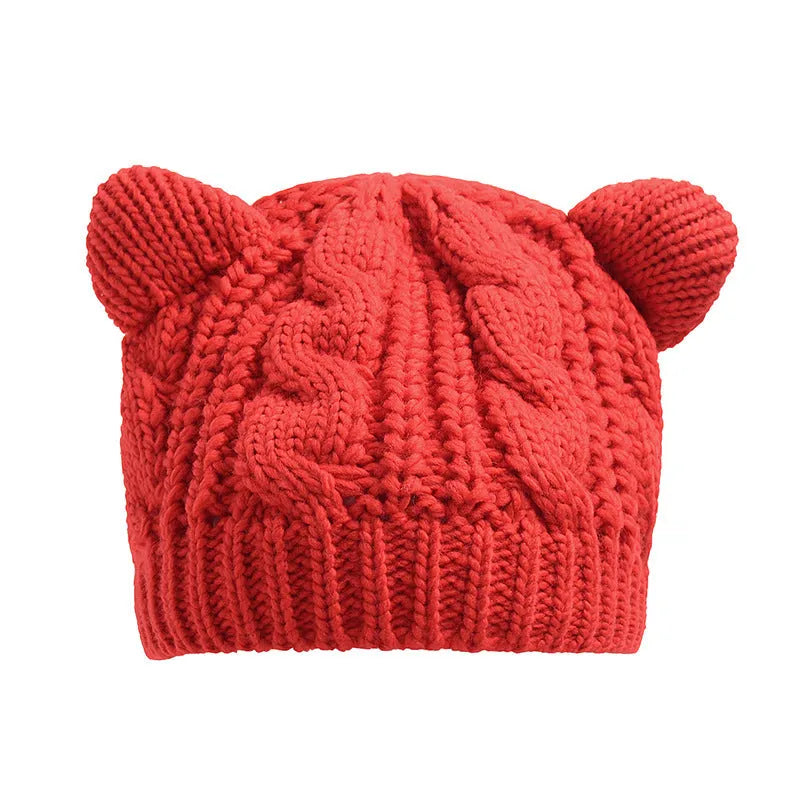 Hand made 3D knitted cat ear winter beanie in wool, shown in multiple colour options