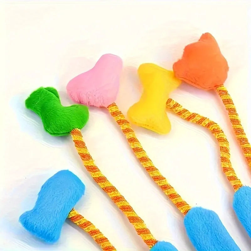 Yellow and blue plush glove cat toy with bell and long trailer, shown with dimensions 40cm by 11cm.