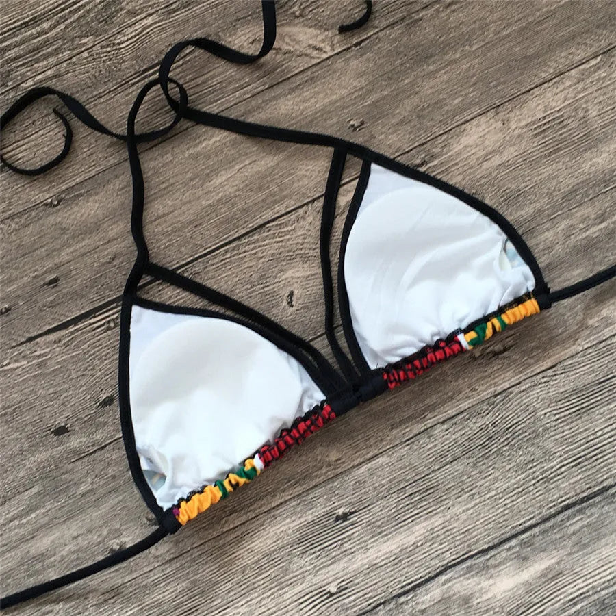 Women's high-waisted digital print bikini set with backless top and quick-drying fabric.