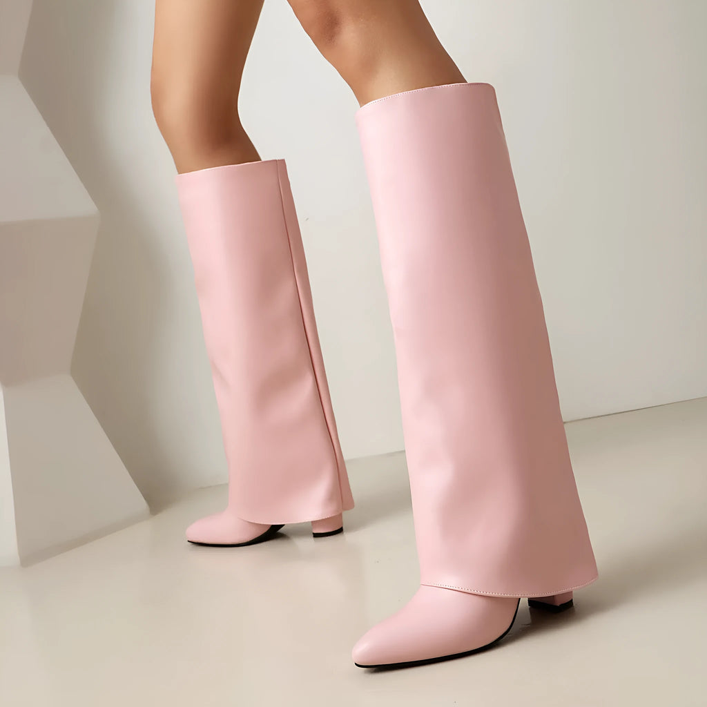 Women's black thick high heel ankle boots with sewing line detail on a white background