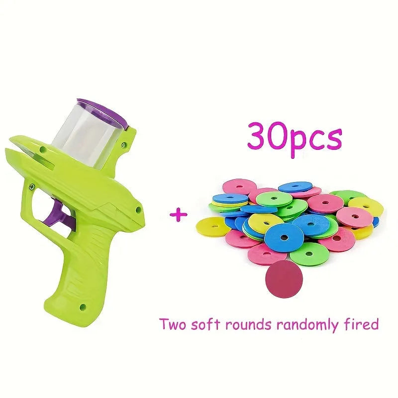 Green interactive cat toy launcher with foam discs for automatic launching play