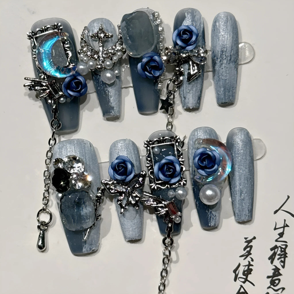 Evening manicure set in heavy industry night blue with rose, tulip, and flower patterns on plastic armour suit